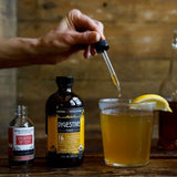 Détail gingembre et citron dans le tonique Herbal Revolution pour une saveur rafraîchissante.