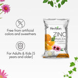 Pastilles orange HERBION Naturals avec ingrédients naturels.