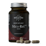Gélules rouges Mico-Rei dans un flacon en verre, potentiel soutien immunitaire.