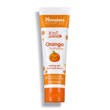 Dentifrice Himalaya Botanique pour enfants orange; tube visible, brossage doux sans fluorure.