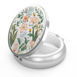 Boîte-pilules florale Hion, rangement élégant et pratique pour le quotidien.