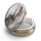 Hion boîte-pilules avec miroir, design bronze et compact, pratique en déplacement.