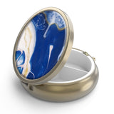 Boîte à pilules Hion ronde avec miroir et finition bronze pour le voyage