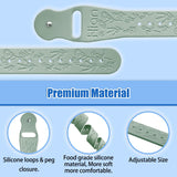 Hion Motion, perles d'acupression blanches et métal sur le bracelet.
