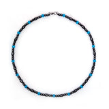 Collier magnétique Hion avec hématite et aigue-marine, aspect élégant.