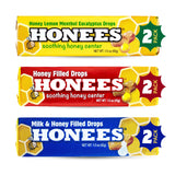 Gros plan sur Honees Drops Miel Rempli dans une bouteille pour soulager la gorge.