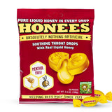 Gouttes Honees au miel dans boîte de 20, douceur naturelle pour la gorge.