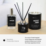 Ambiance spa à domicile avec Bougie Noire Velours 14oz et parfums subtils.