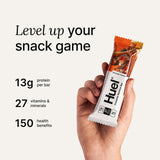 Barre Huel affichant 27 vitamines et minéraux pour l'équilibre nutritionnel.