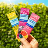 HYDRANT – sachets compacts dans un sac de voyage pour hydratation en déplacement.