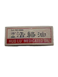 Application sur peau avec l'huile Hysan Huo Lu pour usage local.