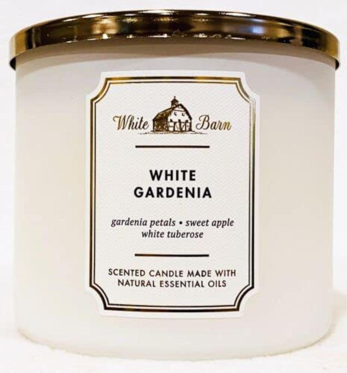 Bougie Iliemoc White Barn à trois mèches avec huiles essentielles pour une ambiance chaleureuse.