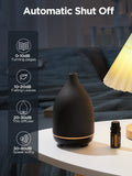Diffuseur InnoGear noir, parfait pour salon et bureau.