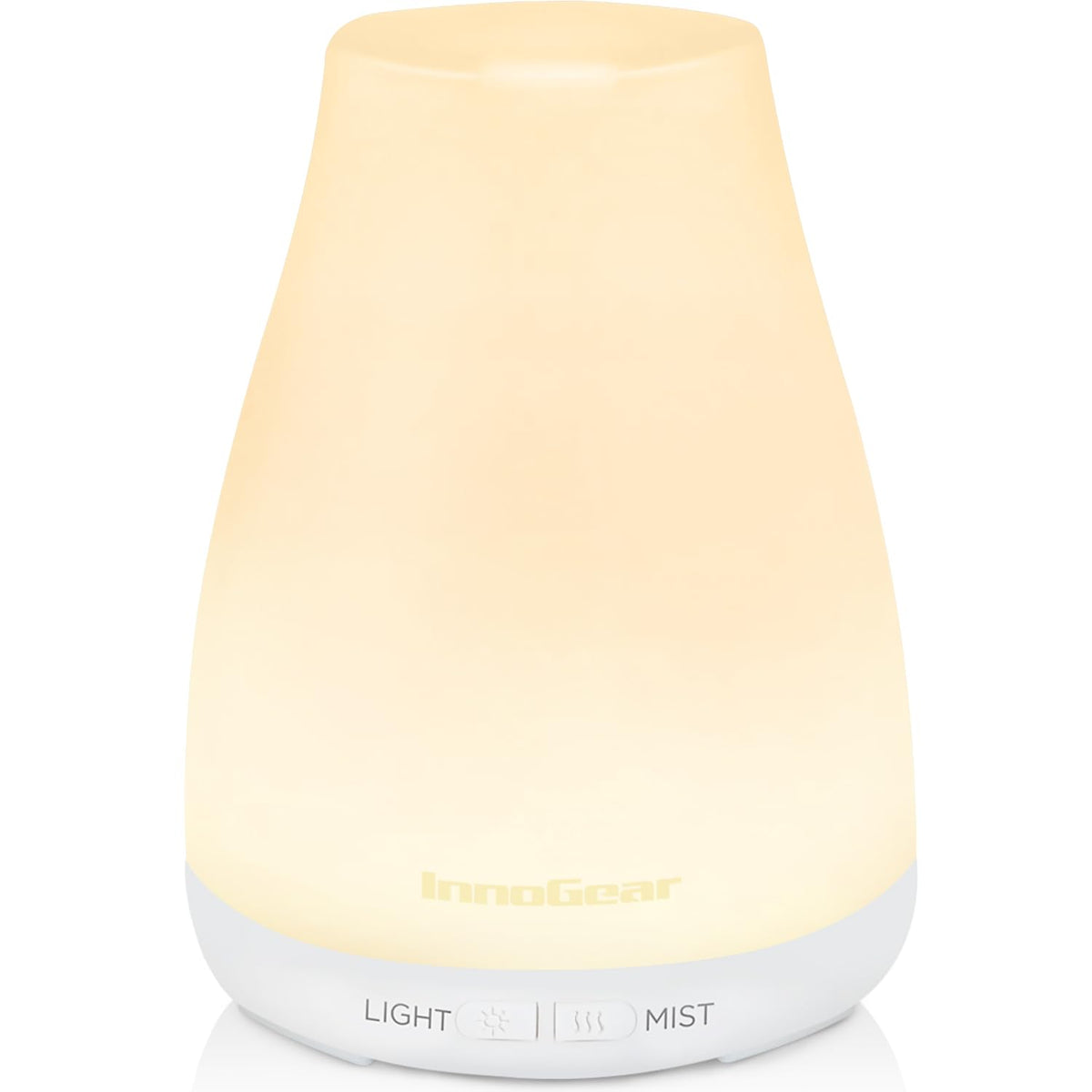 InnoGear diffuseur ultrasonique blanc sur table de chevet créant une ambiance apaisante.