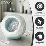 Intergaze LUMINORA bougie ondulation torsadée mettant en valeur le design.