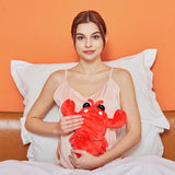 Intoypad peluche-homard-reutilisable, compagnon chaleureux pour la maison ou le bureau.