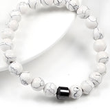IQIC bracelet acupressure PC6 HT7 aide à retrouver le calme et la concentration.