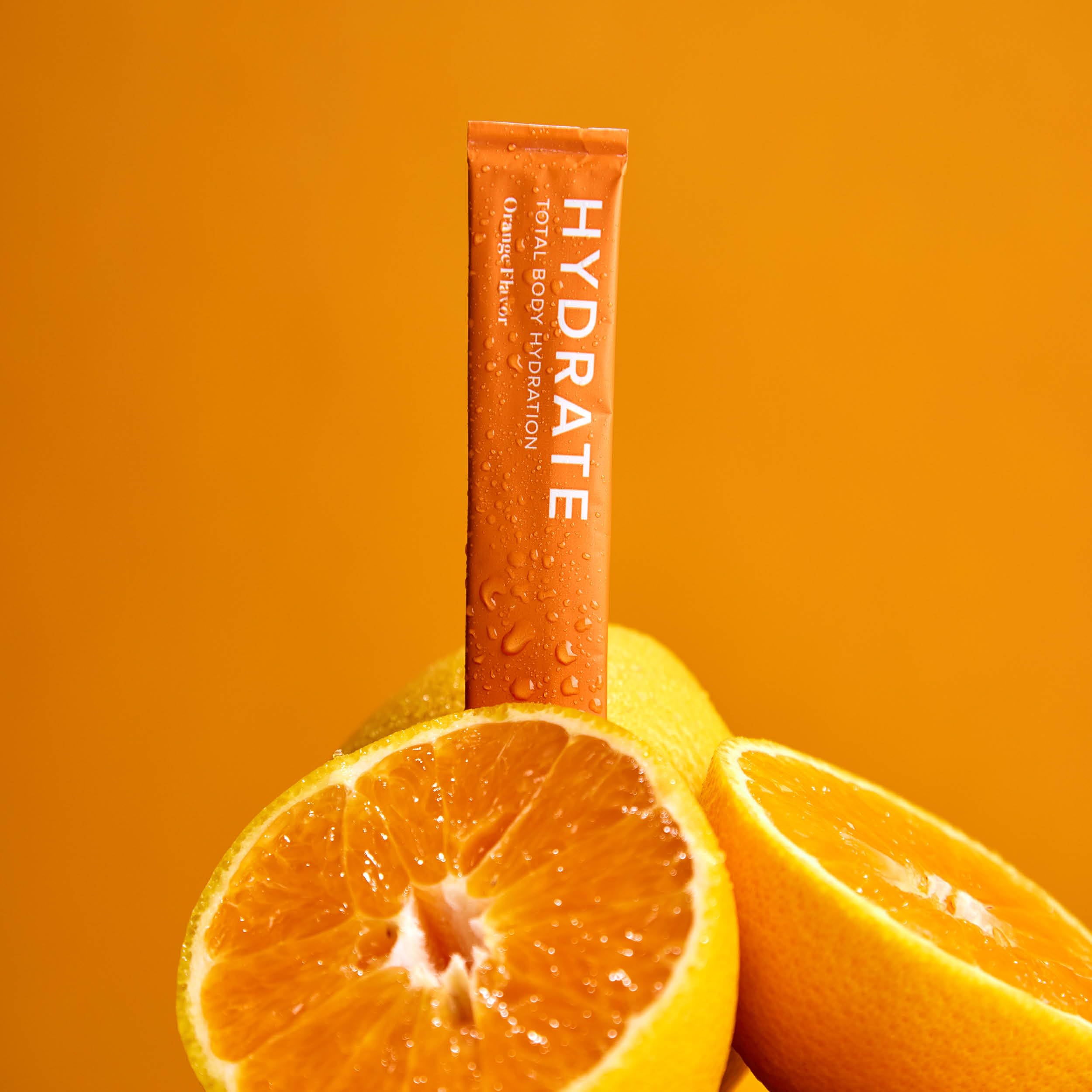Isagenix Hydrate — goût pêche-limonade avec vitamines essentielles pour soutenir l'immunité.