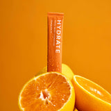 Isagenix Hydrate — goût pêche-limonade avec vitamines essentielles pour soutenir l'immunité.