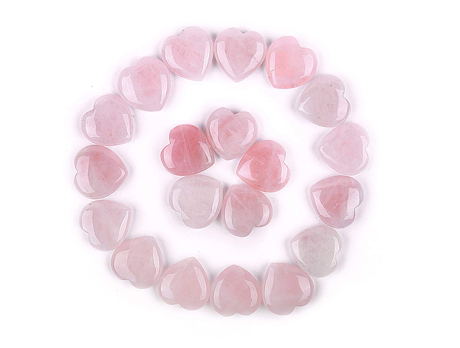 JIC Gem coeur-rose-quartz-detail: nuances variées et authenticité.
