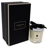 Bougie Jo Malone dans son emballage chic, prêt à offrir.