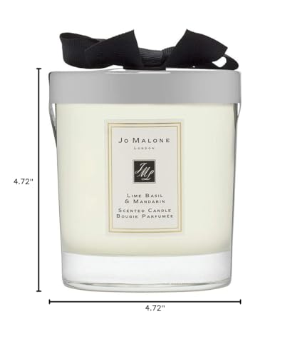 Récipient en verre clair Jo Malone, mise en valeur du parfum.