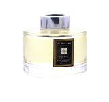 Emballage Jo Malone Lime Basil & Mandarin, bouchon et présentation soignés pour un espace chic.