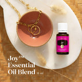 Joy de Young Living: gouttes avec pipette pour une application topique précise.