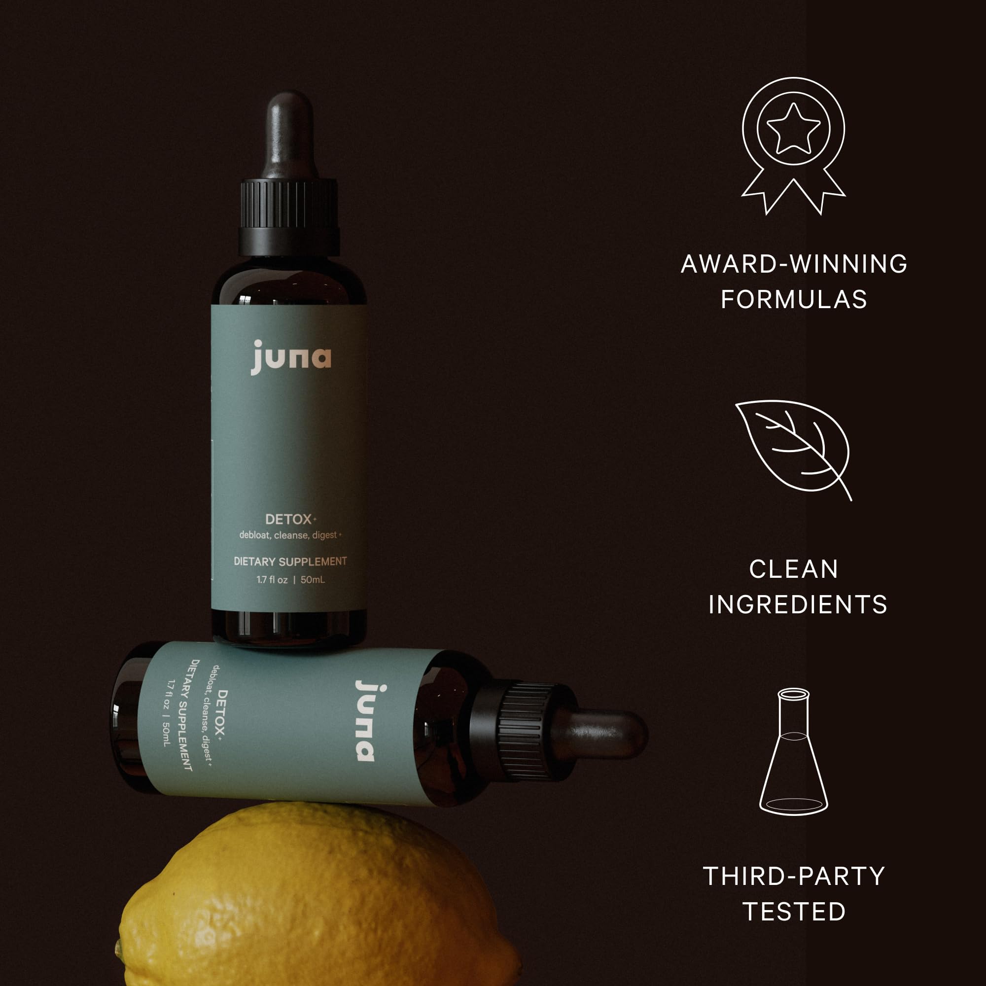 Plan de travail avec flacon Juna chlorophylle et citrons.