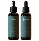 Gouttes Juna chlorophylle dans une bouteille fraîche et lumineuse.
