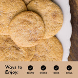 Poudre protéines Just Ingredients Snickerdoodle, texture veloutée pour shakes nutritifs.