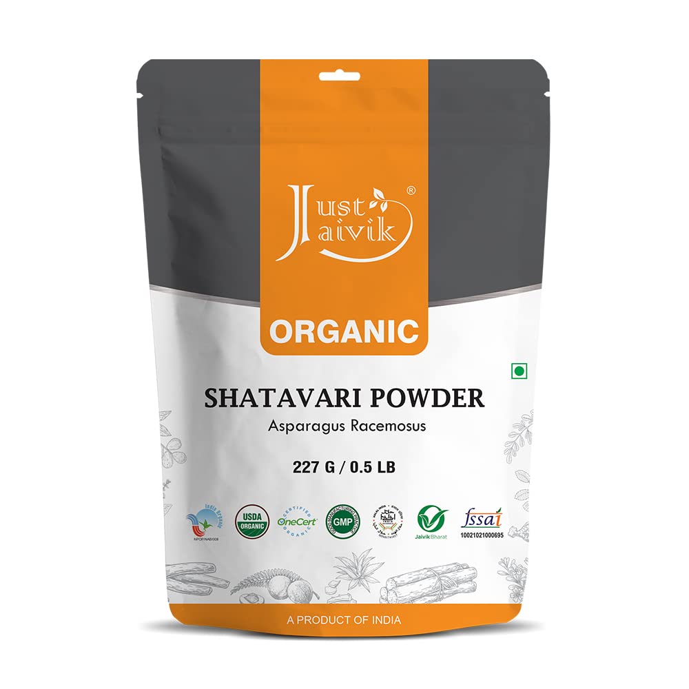 Just Jaivik Poudre Shatavari dans un bocal bio, soutien potentiel à l'équilibre hormonal.