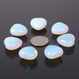 Justinstones: détail du cœur opalite, texture et artisanat uniques.