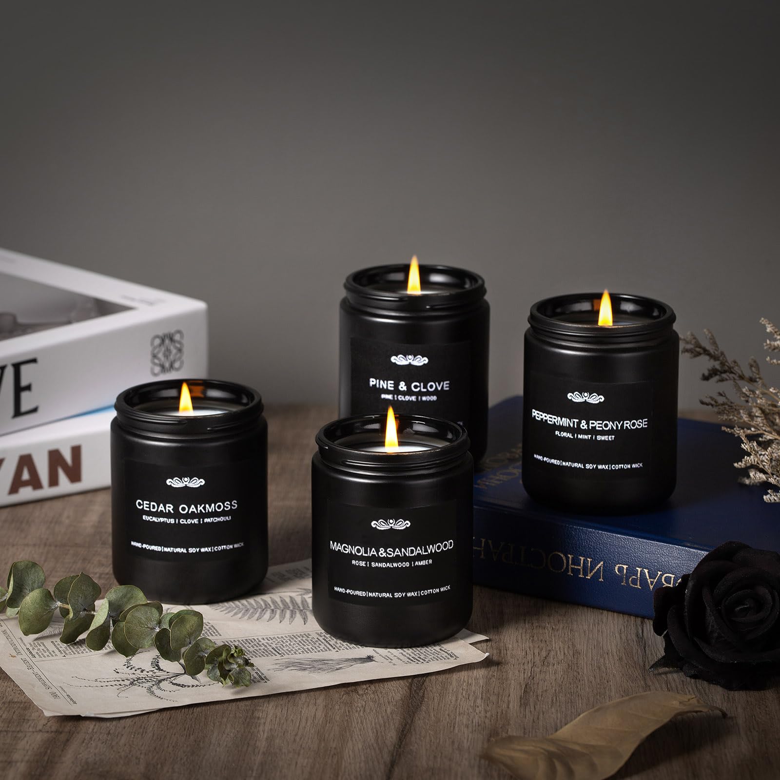 Bougies JXDLSQ dans boîte noire au design masculin et moderne.
