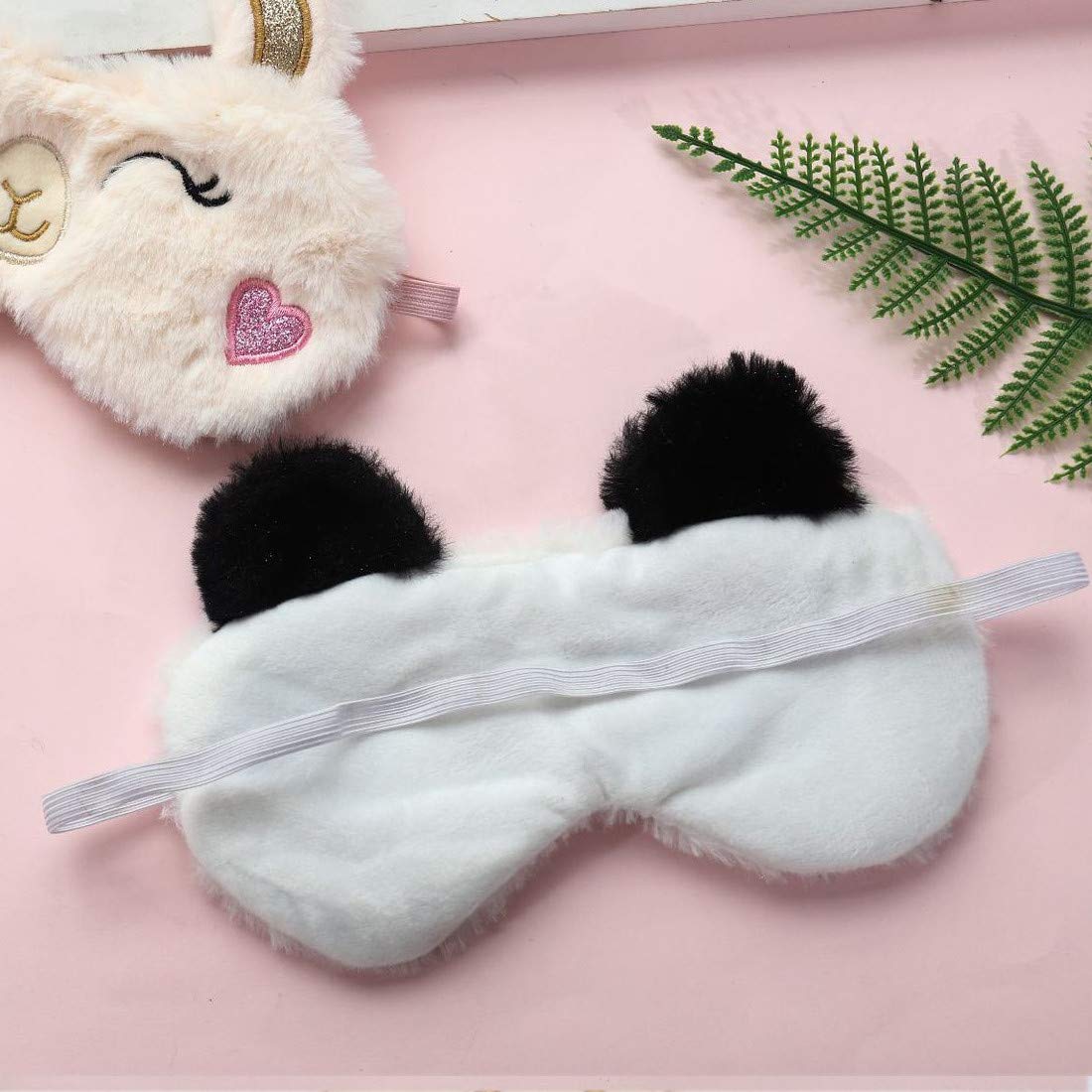 Masque velours rose KANOA, design doux et enveloppant pour sommeil profond.