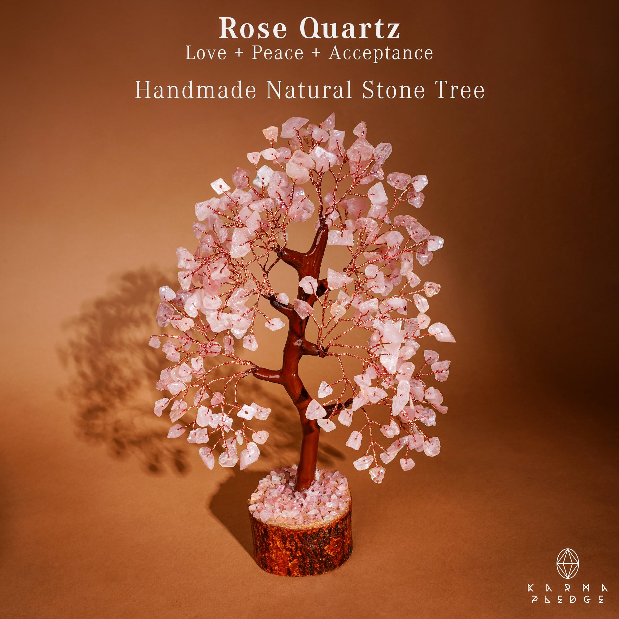 Détail du cristal quartz rose sur l’arbre KARMAPLEDGE, éclat doux