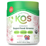 KOS Poudre Verte Framboise dans un verre d eau froide pour énergie et goût fruité.