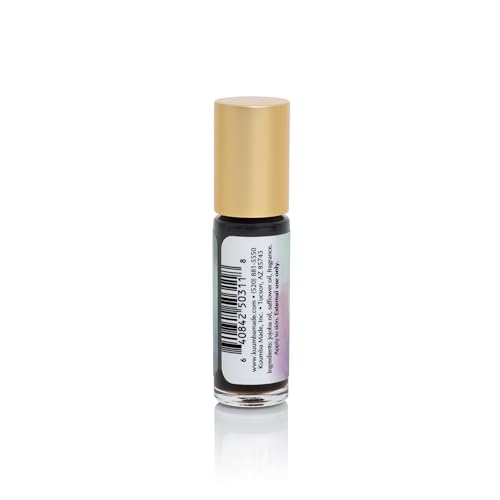 Kuumba Made huile parfum-noix-de-coco-noir, application précise pour une touche gourmande.