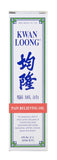 Application locale avec Kwan Loong, huile pour massage apaisant les tensions musculaires.