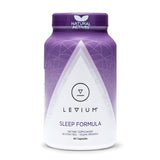 Levium Sommeil: bouteille sur table de nuit prête pour une routine nocturne apaisante.