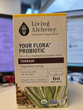 Living Alchemy Your Flora Terrain – capsules sur table, usage quotidien pour un confort digestif potentiel.