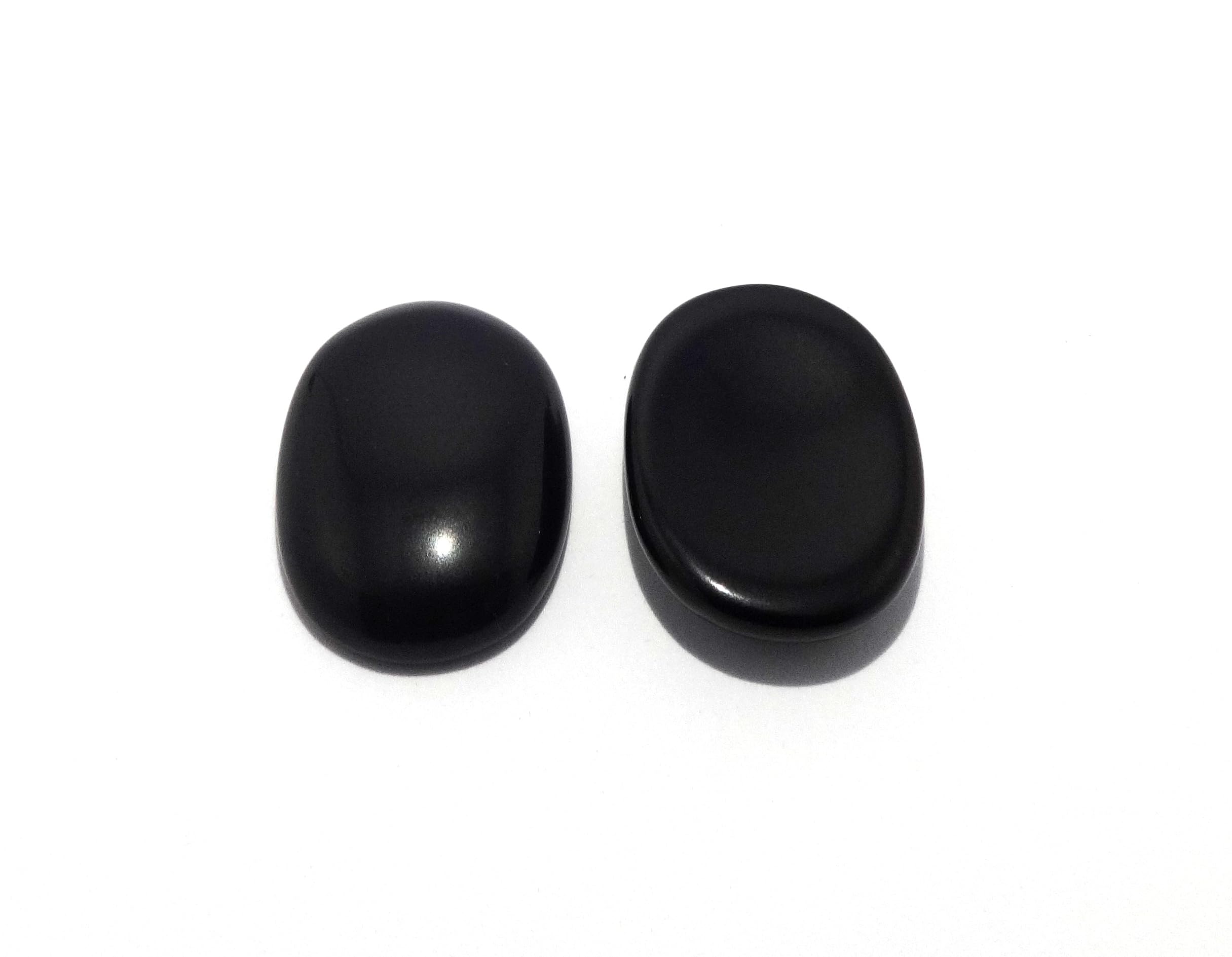 L Pedra et Crystal — surface polie facilitant le mouvement du pouce
