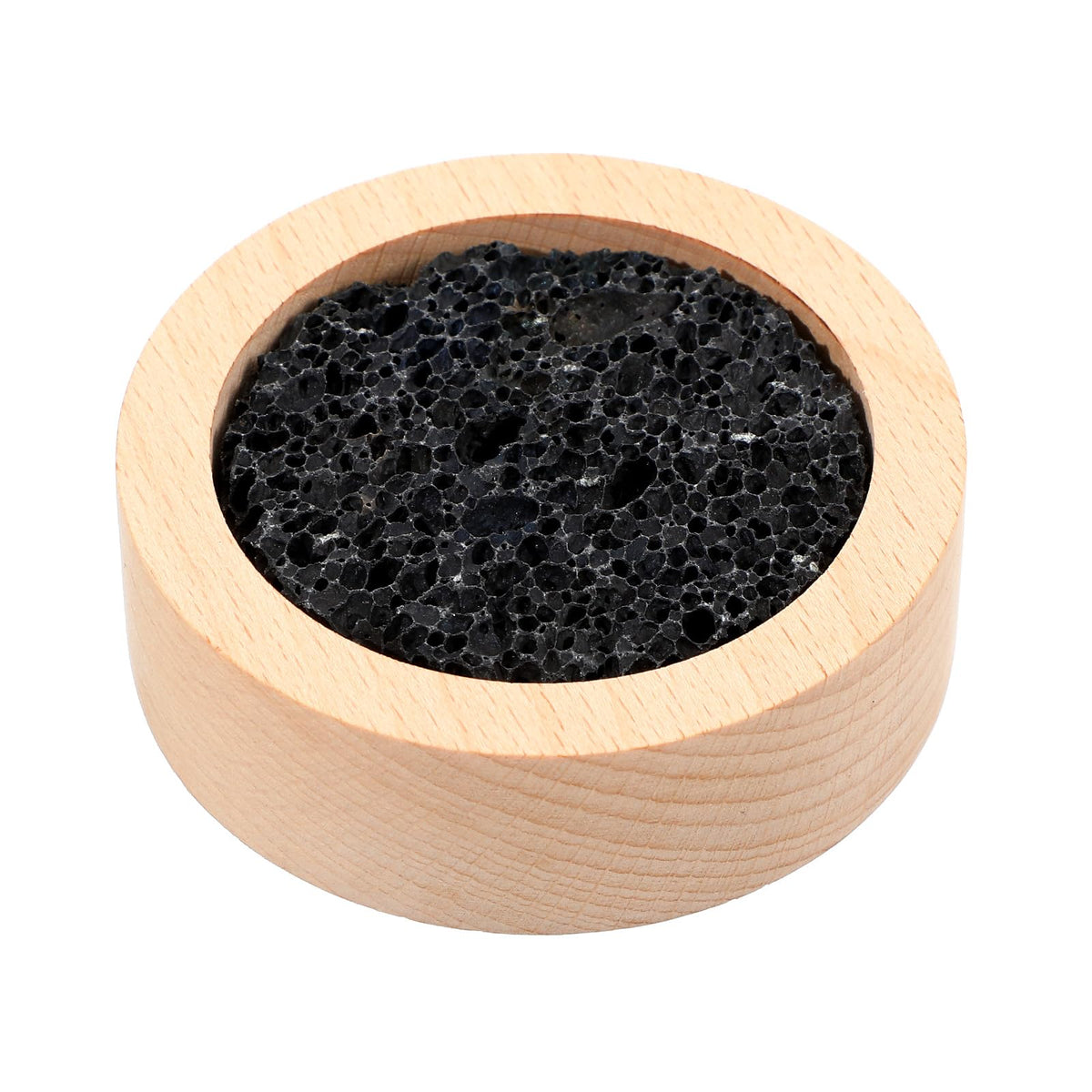 Diffuseur Lusofie en pierre de lave sur base bois, ambiance calme sur le bureau.