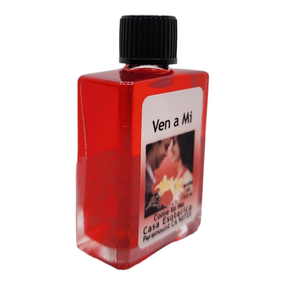 Utilisation d’Huile MAGICK SPACE pour bougies et charms afin d’augmenter l’ambiance rituelle.