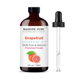 Majestic Pure huile de pamplemousse en flacon ambré avec compte-gouttes pour dosage précis.