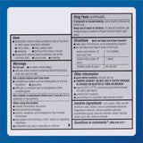Une personne prend un MAJOR Banophen mini-tab pour soulager temporairement les symptômes allergiques.