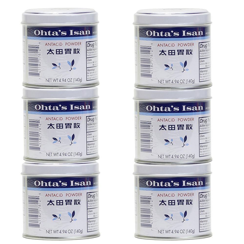 Verre d'eau et poudre Ohta's Isan pour une utilisation pratique.