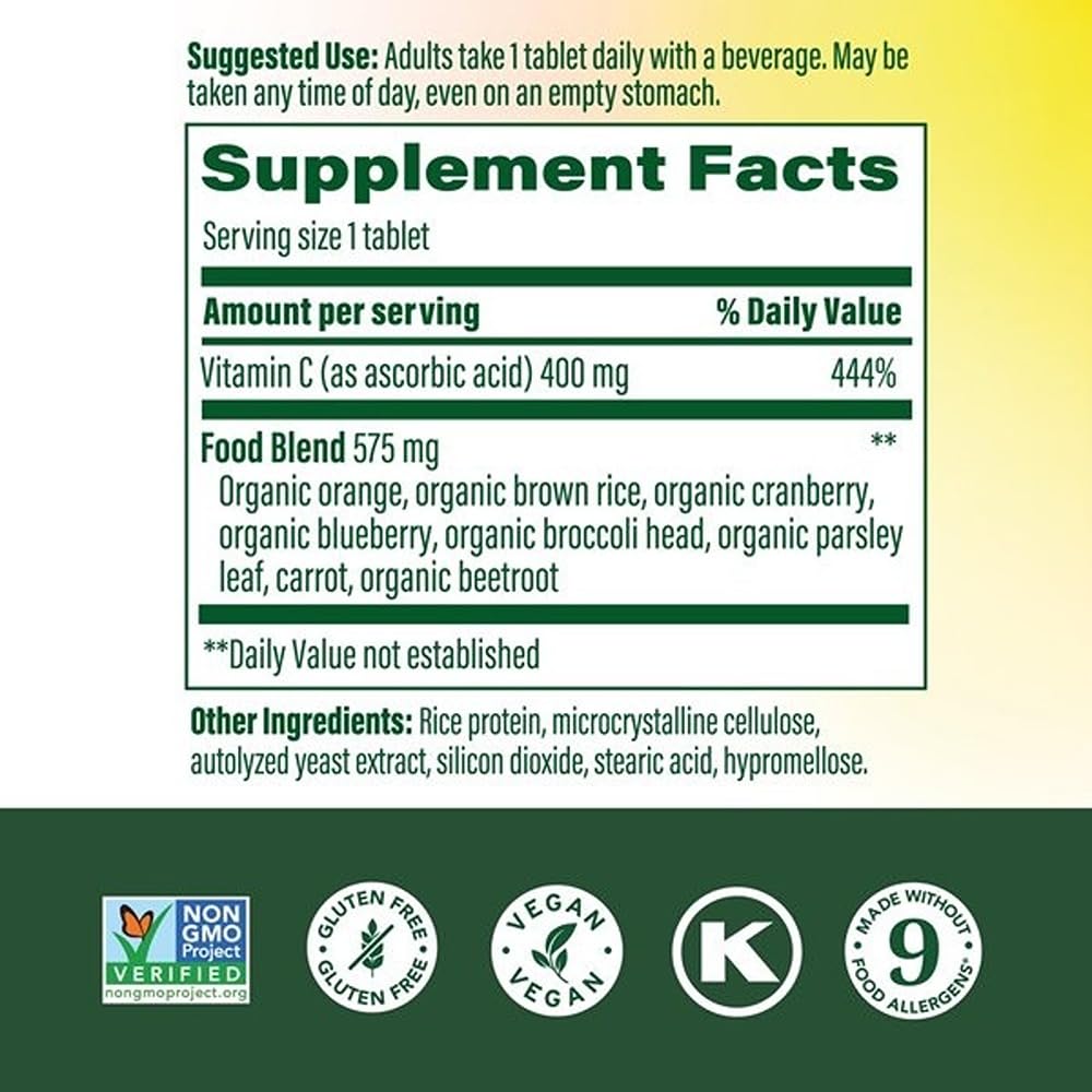 Tablettes MegaFood Ultra C 400 mg prêtes dans un verre d'eau.