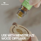 MenstrEaze huile menthe poivrée flacon compact et pratique pour voyage.