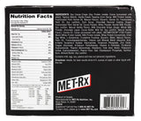 MET-Rx Colossal Cookie Crunch, texture croustillante en gros plan pour snack gourmand.